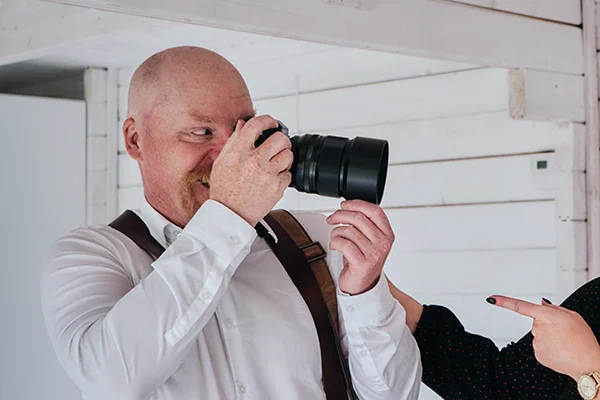Kim Holding a camera